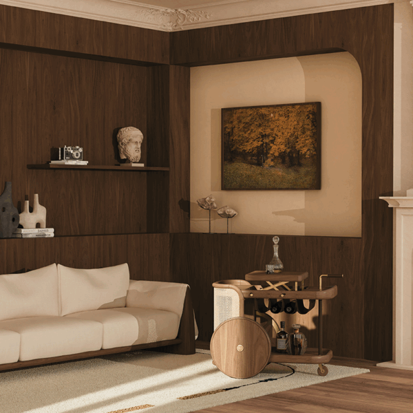 Brinsley Bar Cart, Wood Tailors' New Icon in a living room setting, made of walnut wood and rattan, placed next to a Dudley sofa upholstered in white with smoked walnut wood accents. The room is softly lit by natural light from a window, highlighting the wooden walls and ceiling plaster décor.”