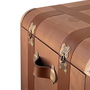 Close-up of the Burke side table highlighting the handles and leather straps.