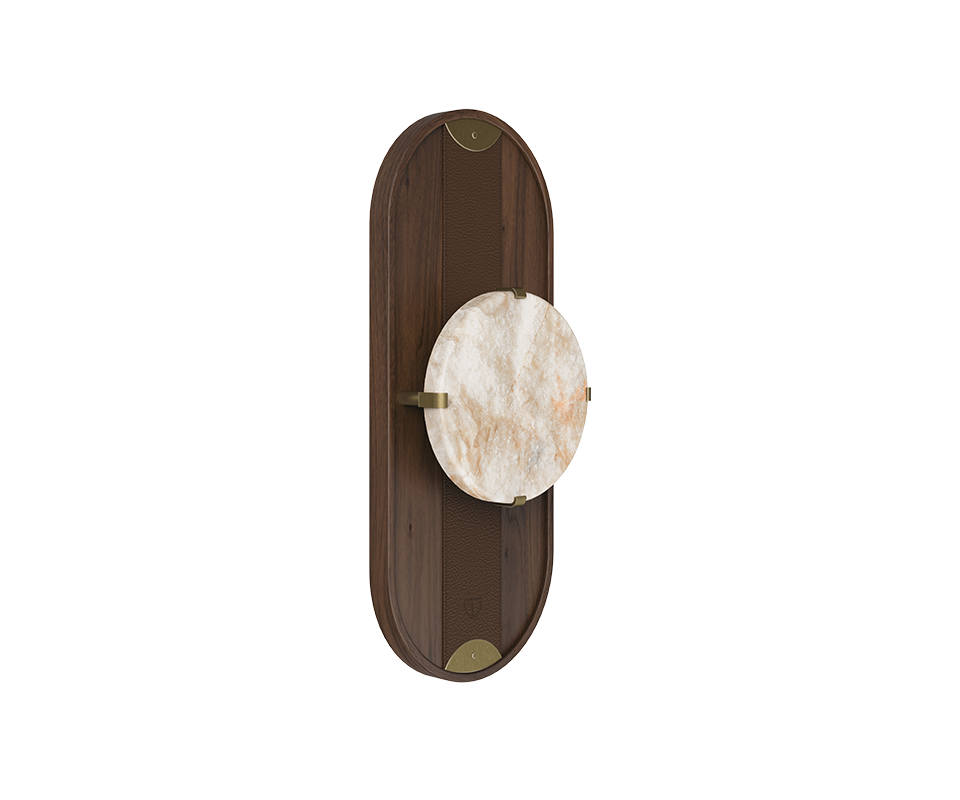 Cavendish Wall Lamp Cavendish Wall Lamp, 45º front view, with the light turned off. Crafted from smoked walnut wood and alabaster, framed in a gentle oval silhouette with aged brushed brass accents, showcasing the lamp’s refined materials and elegant design.