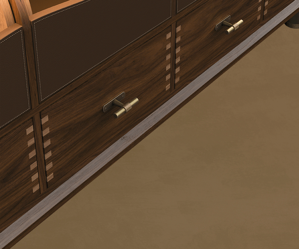 Edward Sideboard Close-up detail of the lower walnut drawers on the Edward Sideboard by Wood Tailors Club, featuring exposed dovetail joinery and T-bar brass handles with knurled detailing.