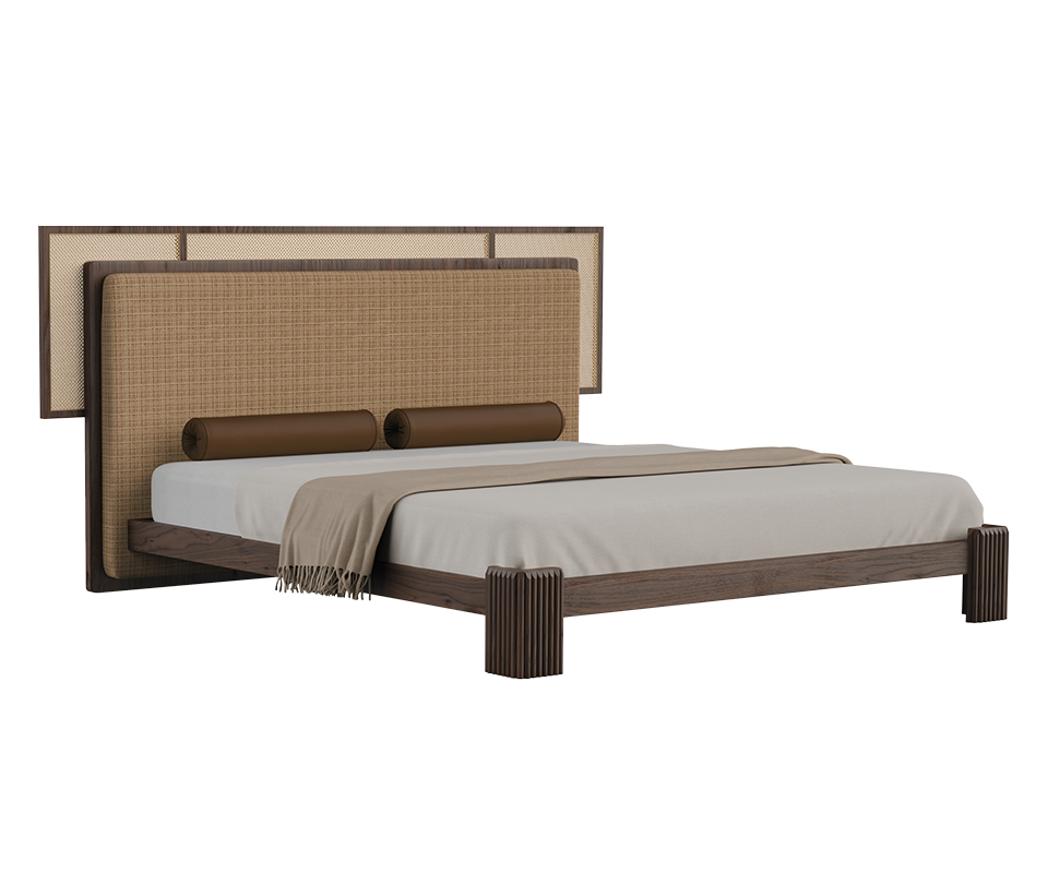 “Forbes bed in a 45º front view, featuring a fabric and rattan headboard, cylindrical leather bolster pillows, and a walnut wood frame, set against a brown background.