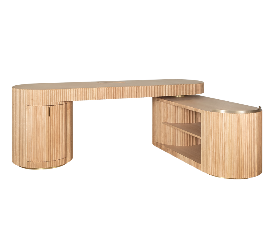 Gifford desk by Wood Tailors Club. Angle view of an L-shaped configuration, with an oak desk, an oak fluted-panel cabinet on the far left, and a lower, rotating oak shelf module with two open shelves extended to the far right. Brass detailing is visible at the bases and shelf trim.