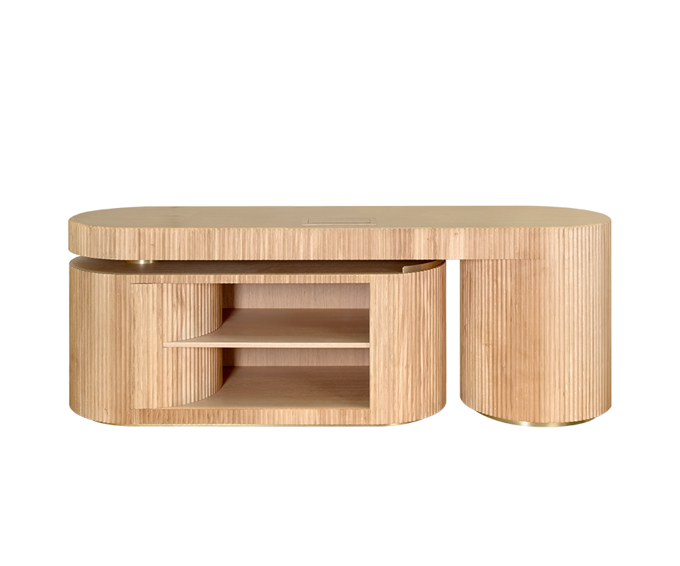 Gifford desk by Wood Tailors Club in oak. Front view of the desk in its closed configuration, showing the main oak desktop over the fluted oak cabinet on the left and the fully retracted fluted oak shelf module on the right. Both curved elements feature brass base accents.