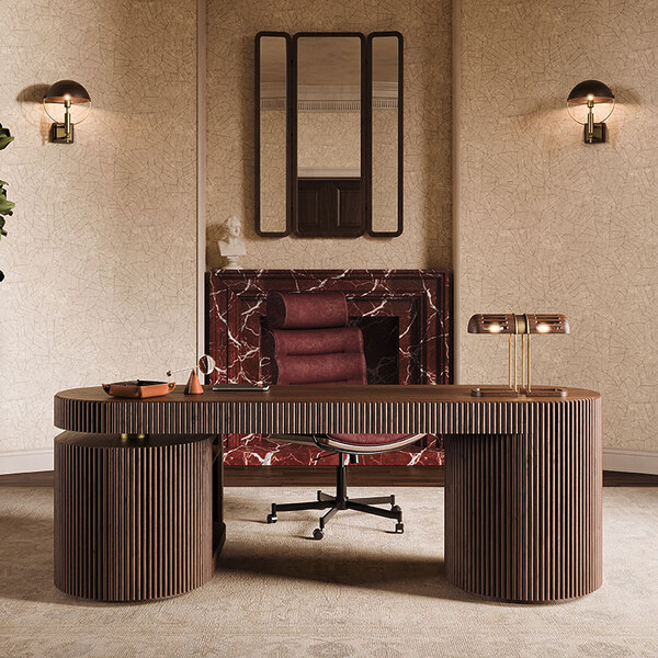 The Office Edition: Where Craftsmanship Meets Character gifford desk ambiente 3 Office Edition: Home office interior featuring the Gifford desk in smoked walnut wood with a Turing table lamp on top, paired with the Thomas office chair upholstered in bordeaux leather. In the background, a marble fireplace with the Tom folding mirror above it is flanked by two illuminated Faraday wall lamps.