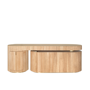 Gifford desk by Wood Tailors Club in oak. Front view of the desk in a linear, closed configuration. The lower oak shelf module is retracted parallel to the main desktop, with its curved, closed fluted side facing forward on the right, adjacent to the fluted oak cabinet on the far left. Brass leg details are visible.