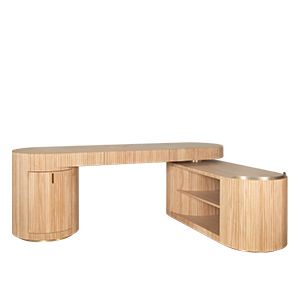 Gifford desk by Wood Tailors Club. Angle view of an L-shaped configuration, with an oak desk, an oak fluted-panel cabinet on the far left, and a lower, rotating oak shelf module with two open shelves extended to the far right. Brass detailing is visible at the bases and shelf trim.