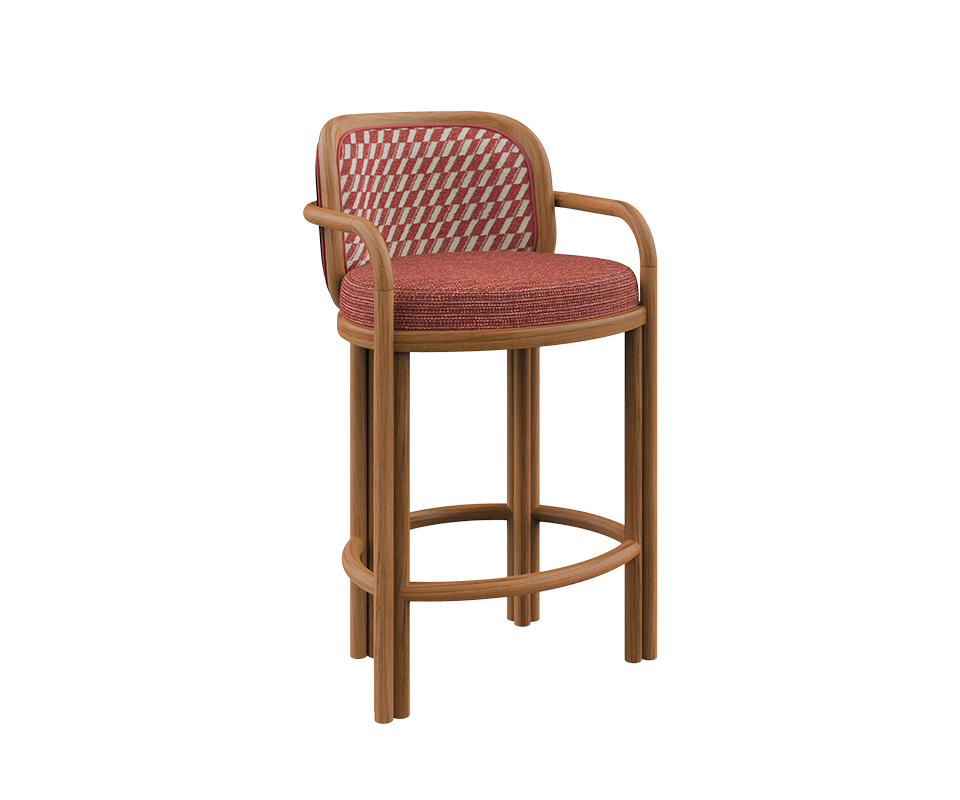 The James bar chair from Wood Tailors Club stands tall on a solid teak wood base. It boasts a striking red and white geometric checkered fabric on the backrest and a richly textured red seat cushion, creating a vibrant focal point.