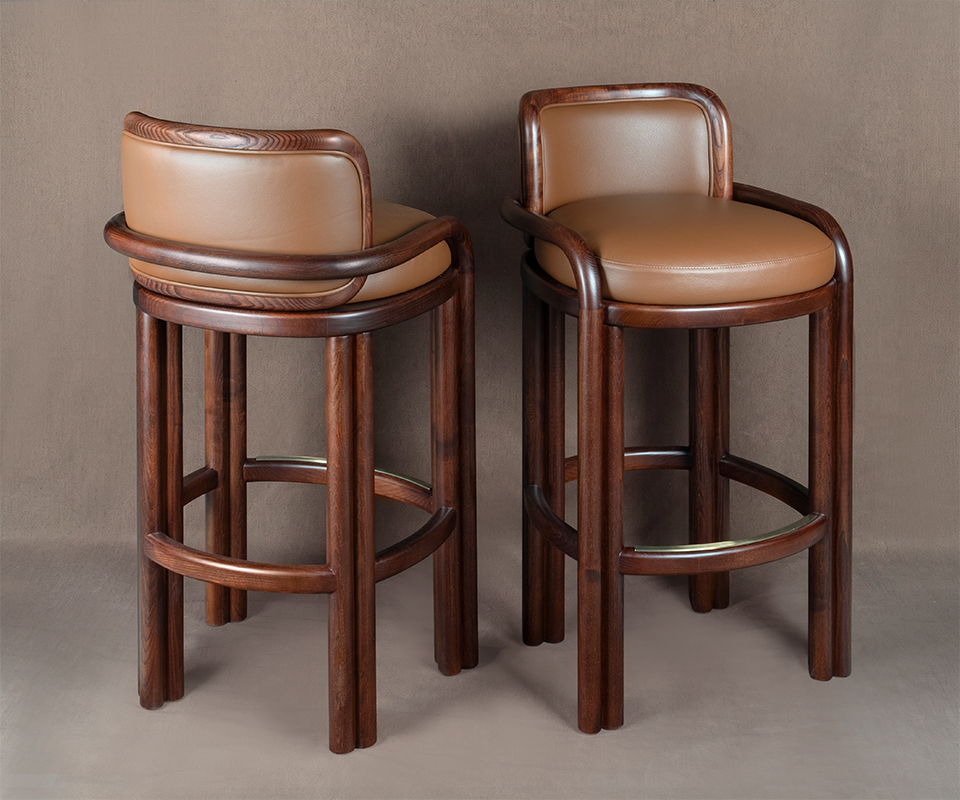 James Bar Chair Pair of James Bar Chairs in dark smoked walnut wood and tan genuine leather, displaying front and back dynamic angles on a neutral beige background.