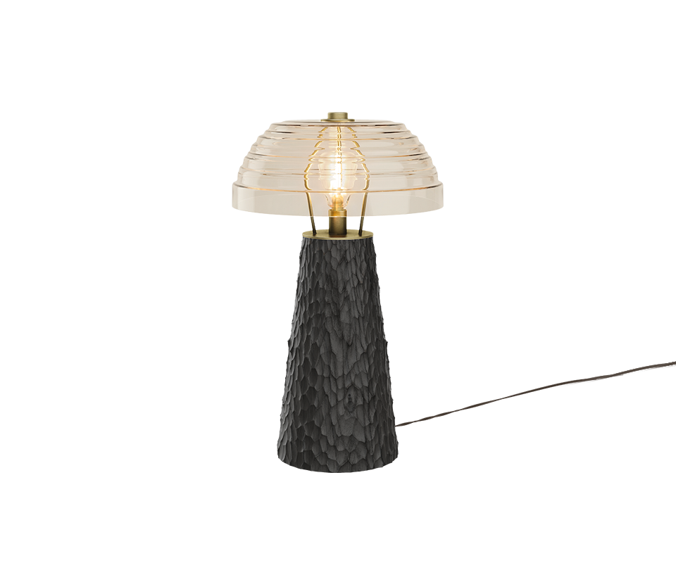 Lloyd I Table Lamp in Hammered black stained ashwood with light turned on.