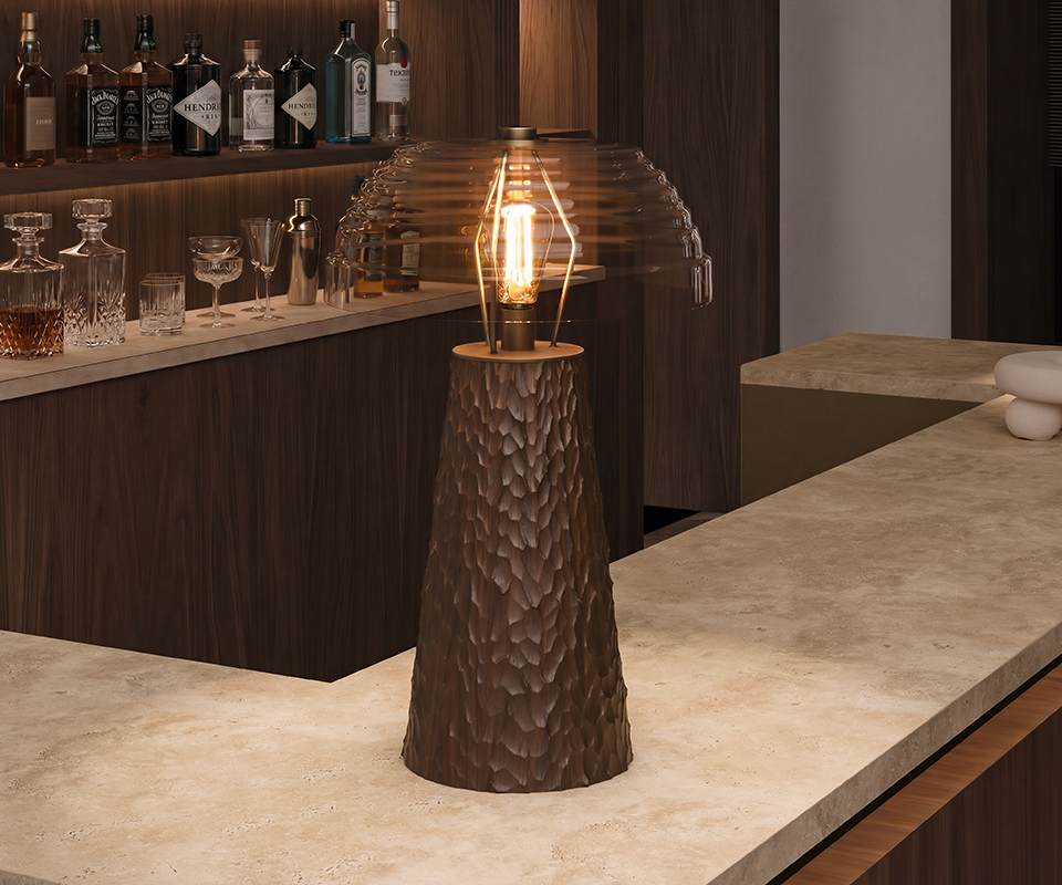 Lloyd I Table Lamp in bar setting crafted in hammered smoked walnut wood.