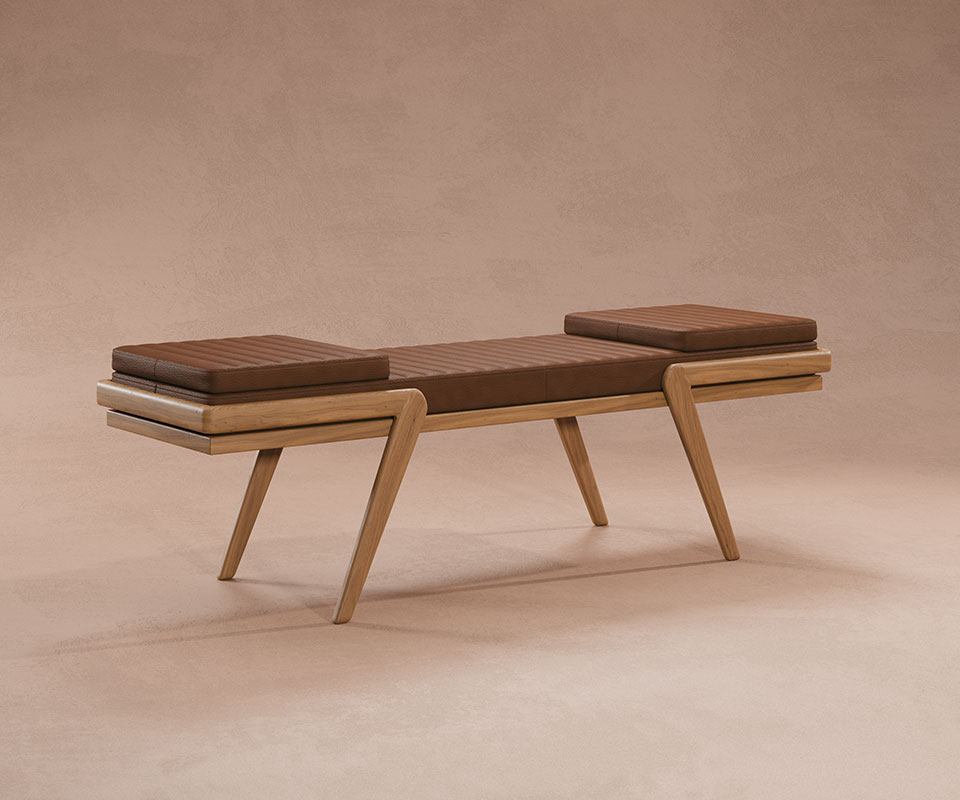Milton Bench Milton Bench with a natural oak frame and orange leather upholstery, combining warm tones and refined craftsmanship, set against a cream background.