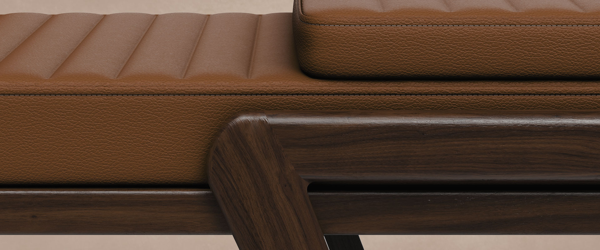 Milton Bench Close-up of the Milton Bench highlighting the orange leather texture and the walnut wood grain.
