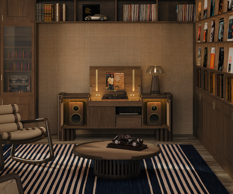 Dark walnut Ronnie Vinyl Sideboard set open in a warm, sophisticated living room with surrounding bookshelves, an illuminated top turntable compartment, and integrated side speakers. In the living room are also one William Rocking Chair, one Lloyd table lamp and Richard center table.