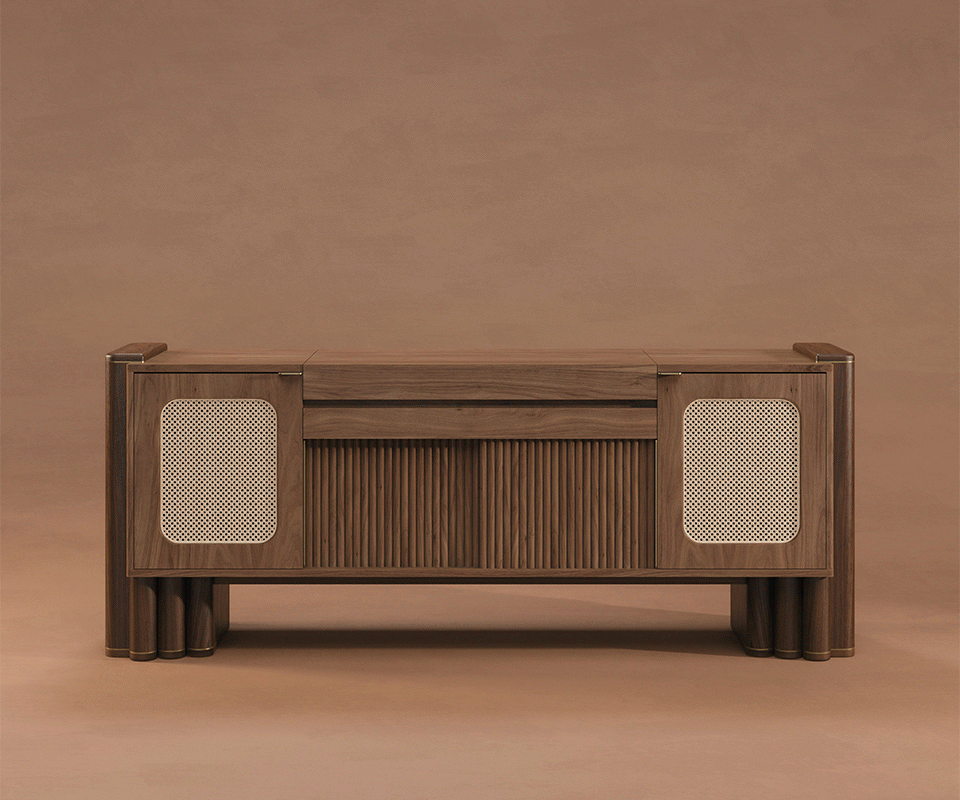 Front view of the closed Ronnie Vinyl Sideboard in dark walnut, featuring rattan door inserts and fluted pillar legs against a soft beige wall.