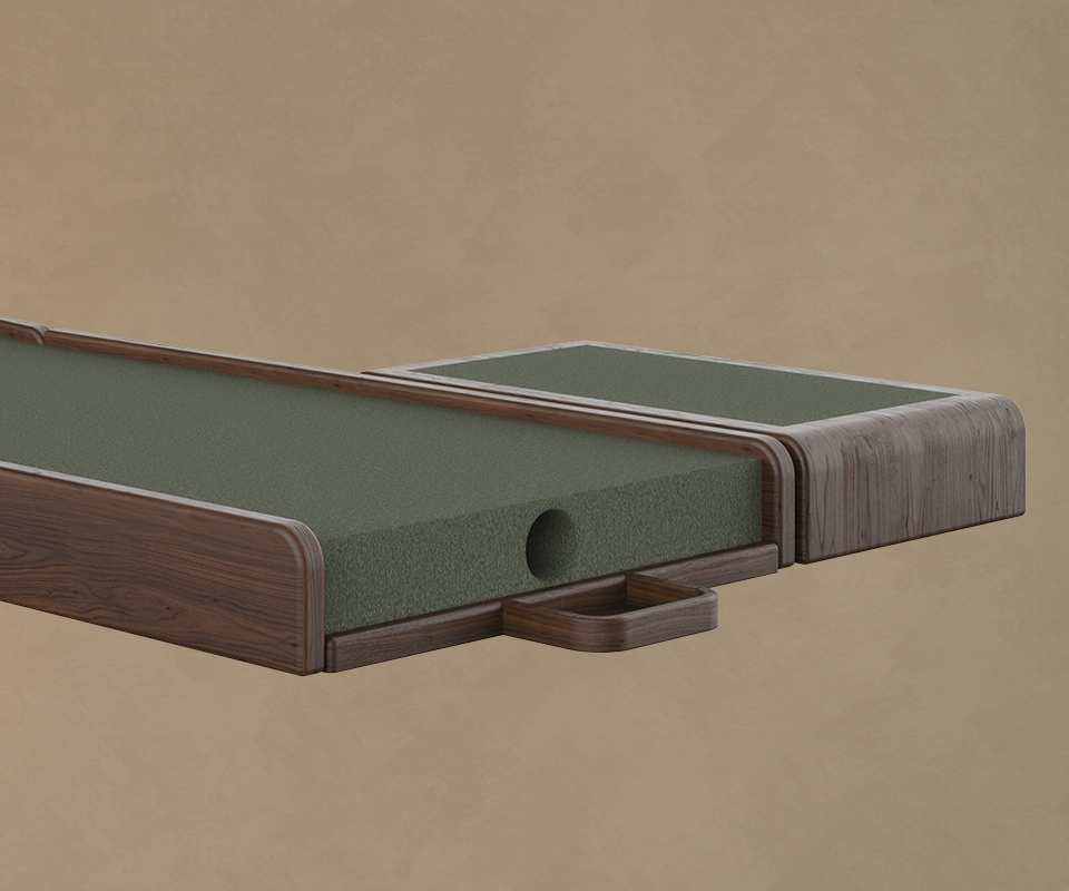 A close-up detail of the Smoked Walnut base, showing the integrated ball return hole.