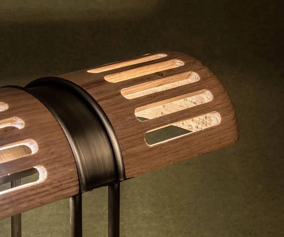 Turing Table Lamp Close-up of the Turing Table Lamp shade, highlighting the aged brass details and natural oak wood grain.