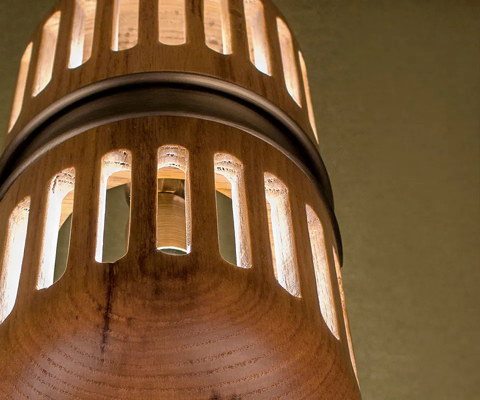 Turing Table Lamp Close-up of the Turing Table Lamp shade, highlighting the aged brass details and natural oak wood grain.