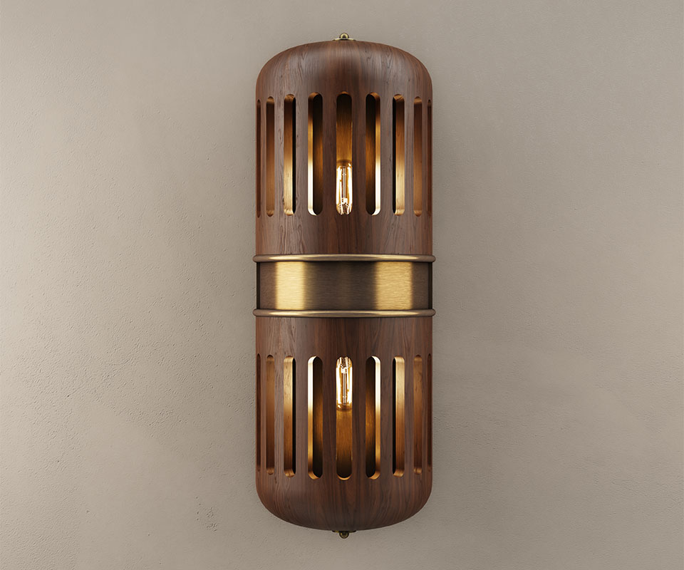 Front view of the Turing wall lamp with the light turned on, meticulously handcrafted in walnut wood with multiple slots and brushed brass details set against a beige wall.