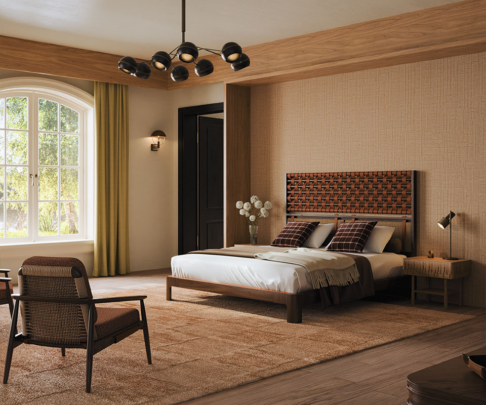 This bedroom furniture features O'Connell II Bed with a headboard featuring leather details in Prestige fabric from Élitis, set in a wooden bedroom with Élitis Abaca wallpaper, a rug by Kelly Wearstler, and Ralph Lauren Wallace throw pillows. The space also includes other bedroom furniture such as Adam armchair upholstered in Melbu 11093.52 fabric by Nobilis, a Fleming suspension lamp, and a Faraday wall lamp.