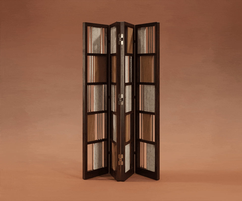 Wordsworth Folding Screen Wordsworth folding screen opening and closing in smoked walnut wood, natural oak, travertine, and brass, set against a burnt orange background.